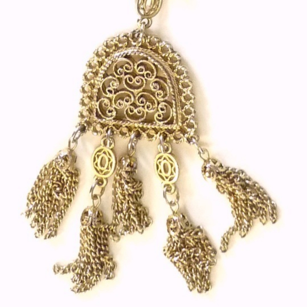 long goldtone multi chain necklace pendant tassel